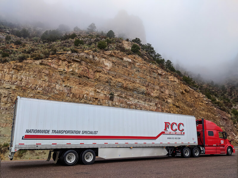 Ideal view of Fremont Contract Carriers truck at Salt River Canyon, Arizona taken by our driver Benda Holman which is most suited for our calendar for the month of October.