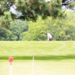 2018 FCC Annual Golf Tournament golfer chipping onto the green