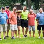 2018 FCC Annual Golf Tournament participants pose, smiling happily