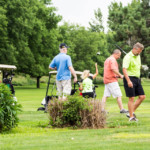 2018 FCC Annual Golf Tournament golfers prepare to head down fairway